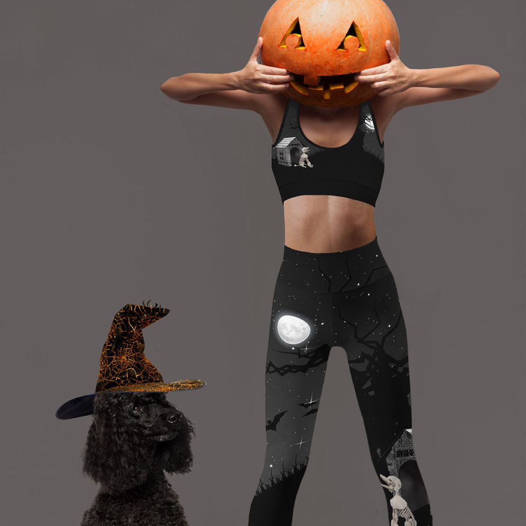 Slim body model playing the ape with pumpkin on the head
